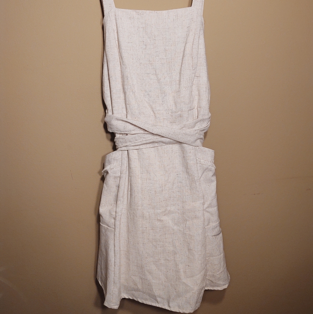 Essue light beige midi dress with bows and pockets